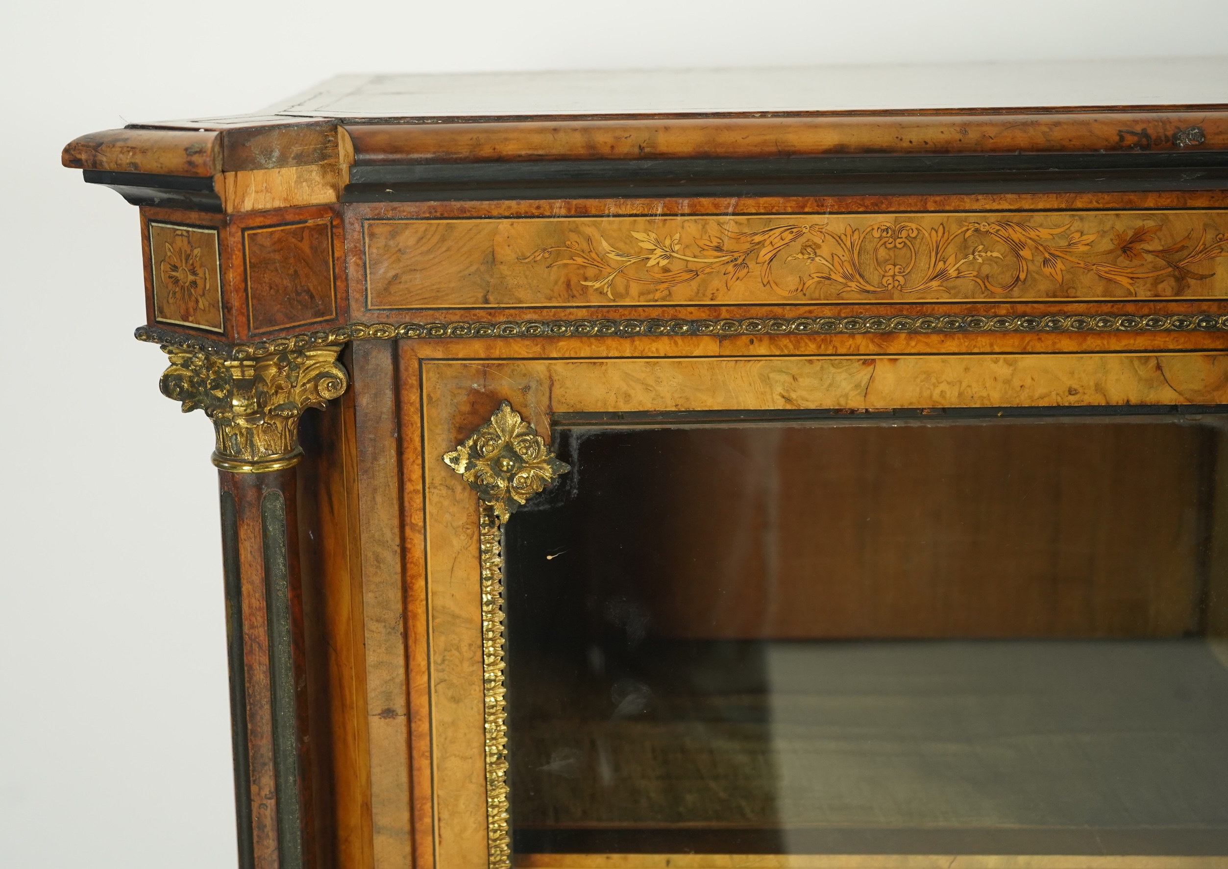 A Victorian birds eye maple banded, gilt metal mounted figured walnut side cabinet